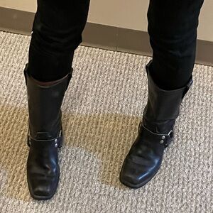 These are black leather boots. They are size 7-7 1/2.